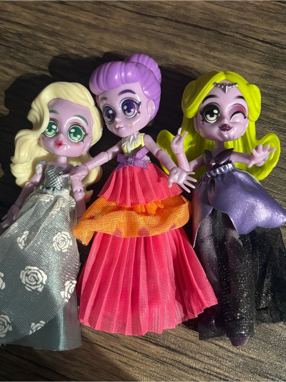 Purple-Skinned Fashion Doll Trio — Pink, Purple & Silver Dresses